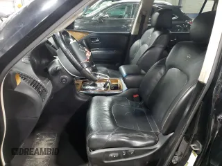 2011 Infiniti QX56 7-passenger with VIN JN8AZ2NE4B9000970, listed as a Copart auction lot 79907174 with 215,410 mi miles and Salvage Title. Bid and sale history available at carsss.com. Image 7.