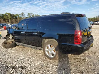 2011 Chevrolet Suburban LT with VIN 1GNSCJE03BR158949, listed as a Copart auction lot 86260394 with 197,012 mi miles and Salvage Title. Bid and sale history available at carsss.com. Image 2.