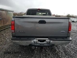 2003 Ford F-250 XL z VIN 1FTNX20F73EA04409, wystawiony jako Copart lot #84228714 z przebiegiem 142 641 mil mil oraz Szkoda całkowita • Salvage title. Historia ofert i sprzedaży dostępna na DreamBid. Obrazek 6.