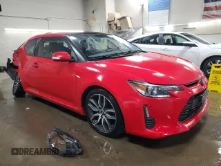 2014 Scion tC z VIN JTKJF5C71E3072025, wystawiony jako Copart lot #51967285 z przebiegiem 187 091 mil mil oraz Szkody całkowita. Historia ofert i sprzedaży dostępna na DreamBid. Obrazek 4.