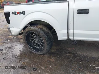 2019 Ford F-150 XL with VIN 1FTEW1EB2KKD98999, listed as a IAAI auction lot 42182839 with 162,098 mi miles and . Bid and sale history available at DreamBid. Image 6.