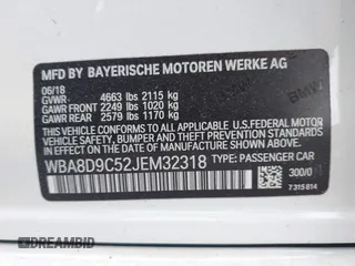 2018 BMW 3 Series 330i xDrive with VIN WBA8D9C52JEM32318, listed as a IAAI auction lot 42309352 with 61,828 mi miles and . Bid and sale history available at DreamBid. Image 9.