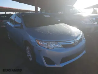 2014 Toyota Camry Hybrid LE with VIN 4T1BD1FK3EU104795, listed as a IAAI auction lot 41756297 with 121,111 mi miles. Bid and sale history available at carsss.com. Image 1.