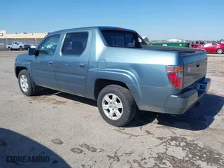 2006 Honda Ridgeline RTL with VIN 2HJYK16526H554016, listed as a IAAI auction lot 42053277 with 220,316 mi miles. Bid and sale history available at carsss.com. Image 3.