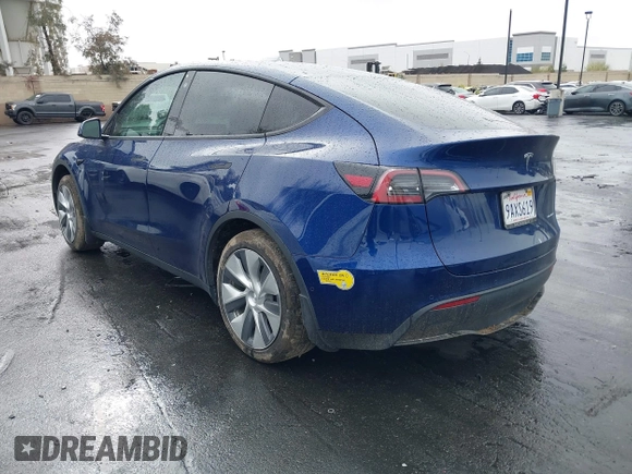 2022 Tesla Model Y Long Range with VIN 7SAYGDEE7NF409294, listed as a IAAI auction lot 41845261 with 73,116 mi miles and . Bid and sale history available at DreamBid. Image 3.