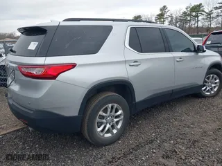 2021 Chevrolet Traverse LT Leather with VIN 1GNERHKW3MJ214421, listed as a IAAI auction lot 42026355 with 999,999 mi miles. Bid and sale history available at carsss.com. Image 4.