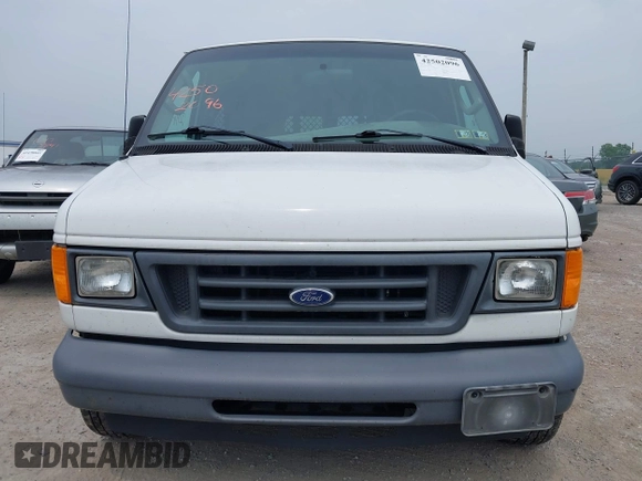 2006 Ford Econoline Cargo with VIN 1FTRE14WX6HB10268, listed as a IAAI auction lot 42502096 with 128,791 mi miles and . Bid and sale history available at DreamBid. Image 6.