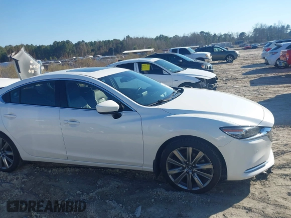 2020 Mazda 6 Signature with VIN JM1GL1XY0L1515151, listed as a IAAI auction lot 41499318 with 46,474 mi miles and . Bid and sale history available at DreamBid. Image 14.