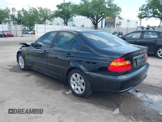 2002 BMW 3 Series 325i with VIN WBAET37412NG78995, listed as a IAAI auction lot 41965274 with 131,138 mi miles. Bid and sale history available at carsss.com. Image 3.