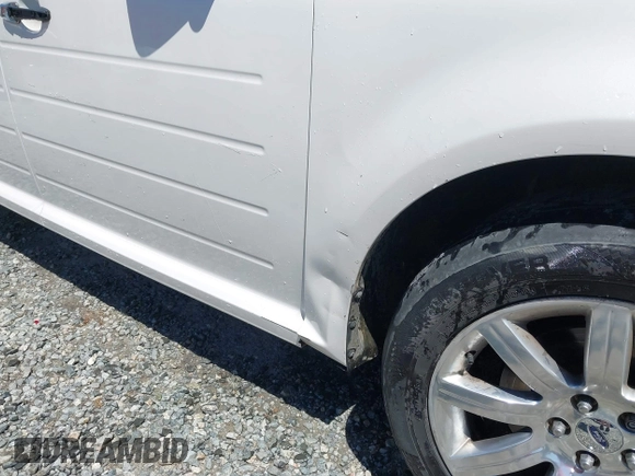 2009 Ford Flex Limited with VIN 2FMDK53C79BA37097, listed as a IAAI auction lot 42052698 with 328,843 mi miles. Bid and sale history available at carsss.com. Image 6.