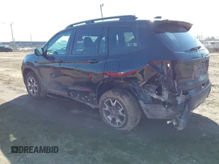 2023 Honda Passport TrailSport with VIN 5FNYF8H67PB042153, listed as a IAAI auction lot 41757909 with 26,810 mi miles and . Bid and sale history available at DreamBid. Image 3.