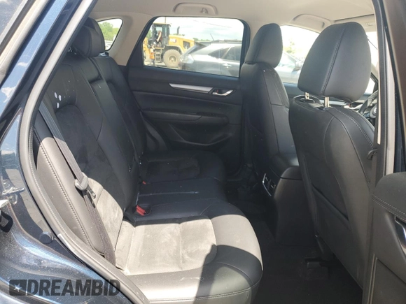 2018 Mazda CX-5 Touring with VIN JM3KFBCMXJ0460020, listed as a Copart auction lot 55997305 with 56,361 mi miles and Salvage Title. Bid and sale history available at DreamBid. Image 11.