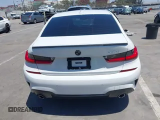 2019 BMW 3 Series 330i with VIN WBA5R1C55KAJ98934, listed as a IAAI auction lot 42396379 with 65,946 mi miles and . Bid and sale history available at DreamBid. Image 16.