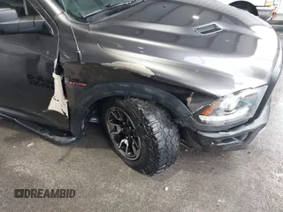 2017 Ram 1500 Rebel z VIN 1C6RR7YT0HS593919, wystawiony jako IAAI lot #41450337 z przebiegiem 164 024 mil mil oraz . Historia ofert i sprzedaży dostępna na DreamBid. Obrazek 6.