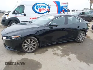2021 Mazda 3 Premium with VIN JM1BPADL4M1329041, listed as a IAAI auction lot 42291604 with 93,248 mi miles and . Bid and sale history available at DreamBid. Image 15.