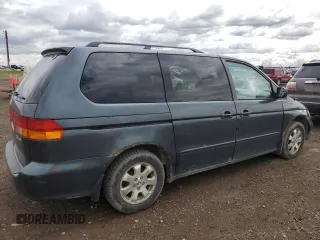 2003 Honda Odyssey EX with VIN 2HKRL18603H008412, listed as a Copart auction lot 55310905 with 352,774 mi miles and Salvage Title. Bid and sale history available at DreamBid. Image 3.
