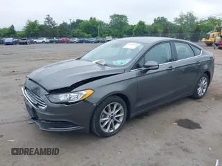 2017 Ford Fusion Hybrid SE with VIN 3FA6P0LU2HR301083, listed as a IAAI auction lot 42602798 with 89,003 mi miles and . Bid and sale history available at DreamBid. Image 2.