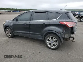 2013 Ford Escape SEL with VIN 1FMCU9H92DUA86916, listed as a Copart auction lot 63516415 with 167,791 mi miles and Salvage title. Bid and sale history available at DreamBid. Image 2.