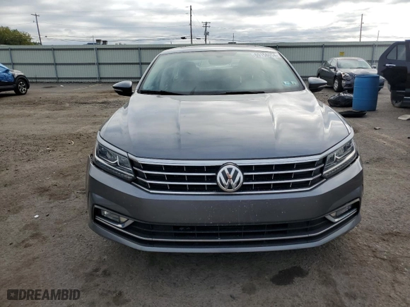 2016 Volkswagen Passat 1.8T SEL with VIN 1VWCT7A32GC065928, listed as a Copart auction lot 69158054 with 133,715 mi miles and Salvage Title. Bid and sale history available at carsss.com. Image 5.