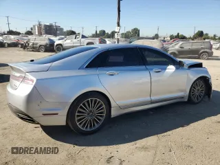 2015 Lincoln MKZ z VIN 3LN6L2G9XFR610736, wystawiony jako Copart lot #80662274 z przebiegiem 101 441 mil mil oraz Szkoda całkowita • Salvage title. Historia ofert i sprzedaży dostępna na DreamBid. Obrazek 3.