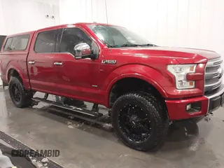 2015 Ford F-150 XLT with VIN 1FTEW1EG5FFB90898, listed as a IAAI auction lot 41617424 with 128,587 mi miles. Bid and sale history available at carsss.com. Image 1.