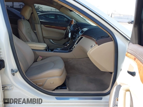 2010 Cadillac CTS with VIN 1G6DK5EVXA0102844, listed as a IAAI auction lot 41818267 with 127,517 mi miles and . Bid and sale history available at DreamBid. Image 5.