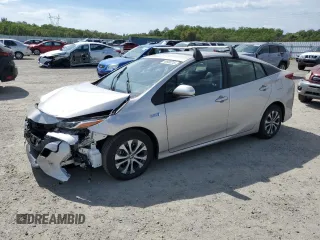 2021 Toyota Prius LE with VIN JTDKAMFP5M3165564, listed as a Copart auction lot 49930215 with 24,742 mi miles and Salvage Title. Bid and sale history available at DreamBid. Image 1.