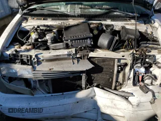 2000 Chevrolet Astro with VIN 1GNDM19W8YB158337, listed as a Copart auction lot 77418574 with Not Provided miles and Salvage Title. Bid and sale history available at carsss.com. Image 12.