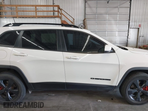 2019 Jeep Cherokee Latitude Plus with VIN 1C4PJMLBXKD294213, listed as a IAAI auction lot 40593826 with 107,332 mi miles. Bid and sale history available at carsss.com. Image 14.