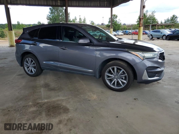 2020 Acura RDX Technology with VIN 5J8TC1H54LL004003, listed as a Copart auction lot 61156075 with 135,236 mi miles and Clean title. Bid and sale history available at DreamBid. Image 4.