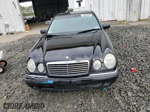 1999 Mercedes-Benz E-Class with VIN WDBJF65H4XA883351, listed as a Copart auction lot 73682964 with 156,446 mi miles and Salvage Title. Bid and sale history available at carsss.com. Image 5.