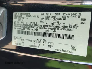 2014 Ford Escape S with VIN 1FMCU0F72EUA67359, listed as a IAAI auction lot 41674501 with 104,580 mi miles. Bid and sale history available at carsss.com. Image 9.