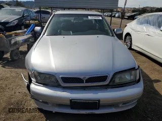 2002 Infiniti G20 Luxury z VIN JNKCP11A42T506808, wystawiony jako Copart lot #75259494 z przebiegiem 69 426 mil mil oraz Szkody całkowita. Historia ofert i sprzedaży dostępna na DreamBid. Obrazek 5.