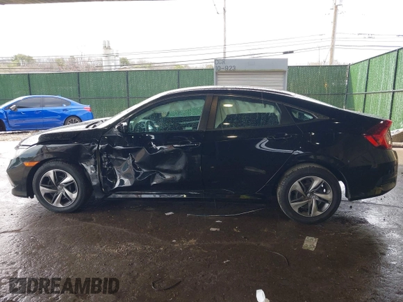 2020 Honda Civic LX z VIN 2HGFC2F61LH587612, wystawiony jako IAAI lot #41955072 z przebiegiem 89 476 mil mil oraz . Historia ofert i sprzedaży dostępna na DreamBid. Obrazek 14.