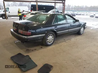1997 Cadillac Seville Luxury SLS with VIN 1G6KS52YXVU816736, listed as a IAAI auction lot 41854220 with 107,091 mi miles. Bid and sale history available at carsss.com. Image 4.