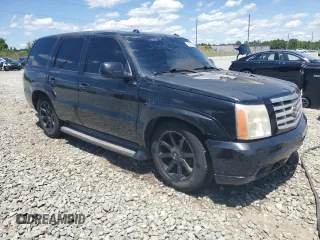 2005 Cadillac Escalade z VIN 1GYEK63N55R212898, wystawiony jako Copart lot #54323405 z przebiegiem Nie podano mil oraz Szkoda całkowita • Salvage title. Historia ofert i sprzedaży dostępna na DreamBid. Obrazek 4.