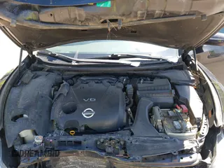 2013 Nissan Maxima SV z VIN 1N4AA5AP1DC838381, wystawiony jako IAAI lot #42210279 z przebiegiem 162 435 mil mil oraz . Historia ofert i sprzedaży dostępna na DreamBid. Obrazek 10.