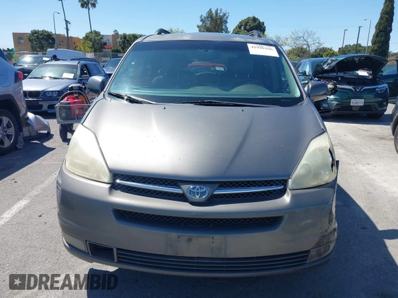 2005 Toyota Sienna XLE with VIN 5TDZA22C65S299604, listed as a IAAI auction lot 41949186 with 205,243 mi miles and . Bid and sale history available at carsss.com. Image 12.