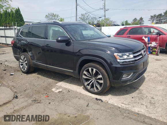 2019 Volkswagen Atlas SEL Premium z VIN 1V2NR2CAXKC620253, wystawiony jako Copart lot #56583635 z przebiegiem 57 734 mil mil oraz Szkoda całkowita • Salvage title. Historia ofert i sprzedaży dostępna na DreamBid. Obrazek 4.