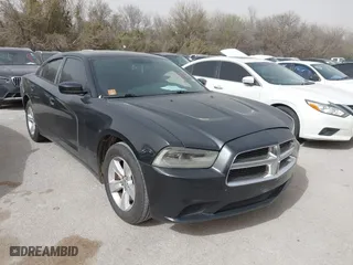 2013 Dodge Charger SE with VIN 2C3CDXBG8DH613669, listed as a IAAI auction lot 41810048 with 194,428 mi miles. Bid and sale history available at carsss.com. Image 1.
