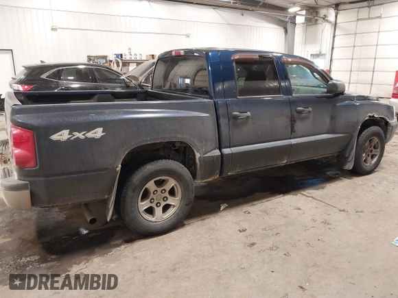 2006 Dodge Dakota SLT with VIN 1D7HW48N16S710729, listed as a IAAI auction lot 41568772 with 133,078 mi miles. Bid and sale history available at carsss.com. Image 4.