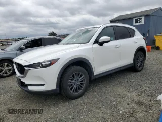 2020 Mazda CX-5 Touring with VIN JM3KFACM0L0857278, listed as a Copart auction lot 51980825 with 73,411 mi miles and Salvage Title. Bid and sale history available at carsss.com. Image 1.
