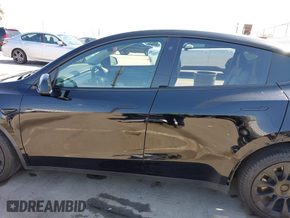 2022 Tesla Model Y Long Range with VIN 7SAYGDEE6NF480471, listed as a IAAI auction lot 41985797 with 82,777 mi miles and . Bid and sale history available at DreamBid. Image 15.
