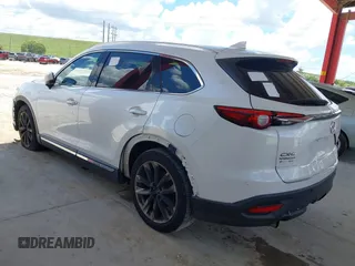 2016 Mazda CX-9 Grand Touring with VIN JM3TCADYXG0113563, listed as a IAAI auction lot 42593120 with 237,696 mi miles and . Bid and sale history available at DreamBid. Image 14.