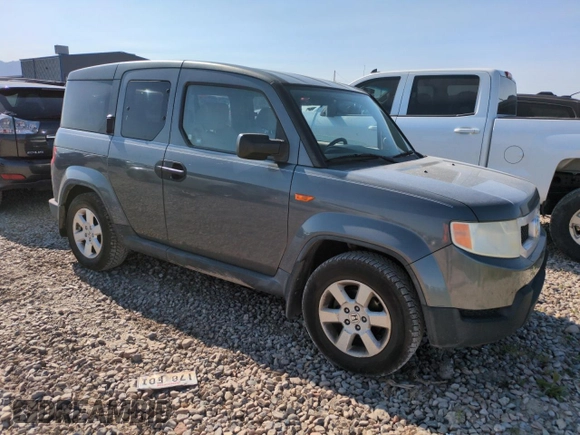 2011 Honda Element EX z VIN 5J6YH1H75BL001482, wystawiony jako Copart lot #59041055 z przebiegiem 206 361 mil mil oraz Szkoda całkowita • Salvage title. Historia ofert i sprzedaży dostępna na DreamBid. Obrazek 4.