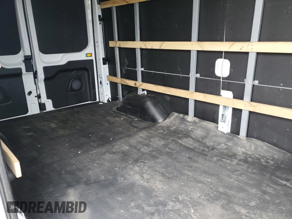 2023 Ford Transit Cargo с VIN 1FTBR1X8XPKB23061, выставлен на аукционе Copart как лот 58814525 с пробегом 24 432 миль миль и Списание • Salvage title. История ставок и продаж доступна на DreamBid. Изображение 11.