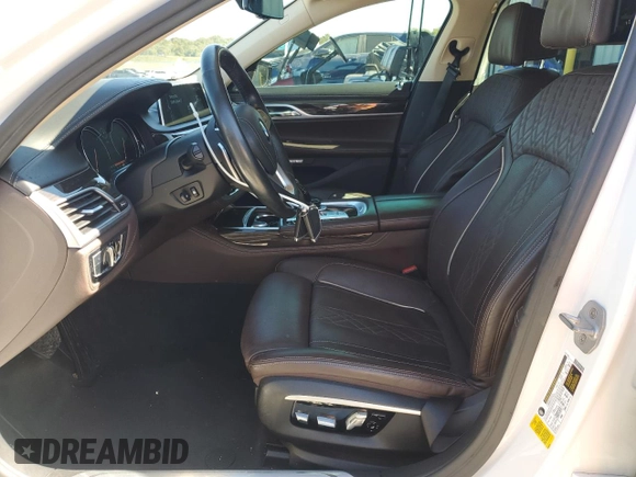 2016 BMW 7 Series 750i with VIN WBA7F0C56GGM20770, listed as a Copart auction lot 75985684 with 92,142 mi miles and Salvage Title. Bid and sale history available at carsss.com. Image 7.