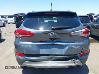 2017 Hyundai Tucson Value with VIN KM8J33A29HU312752, listed as a IAAI auction lot 42575164 with 76,297 mi miles and . Bid and sale history available at DreamBid. Image 16.