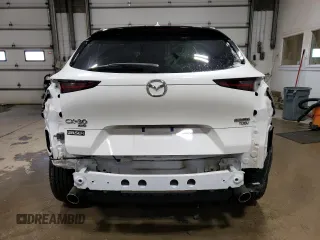 2023 Mazda CX-30 Premium Plus with VIN 3MVDMBEY3PM587798, listed as a Copart auction lot 86524444 with 9,860 mi miles and Salvage title. Bid and sale history available at DreamBid. Image 6.