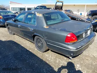 1998 Ford Crown Victoria Police Pkg with VIN 2FAFP71WXWX184526, listed as a IAAI auction lot 41563307 with 309,303 mi miles. Bid and sale history available at carsss.com. Image 3.